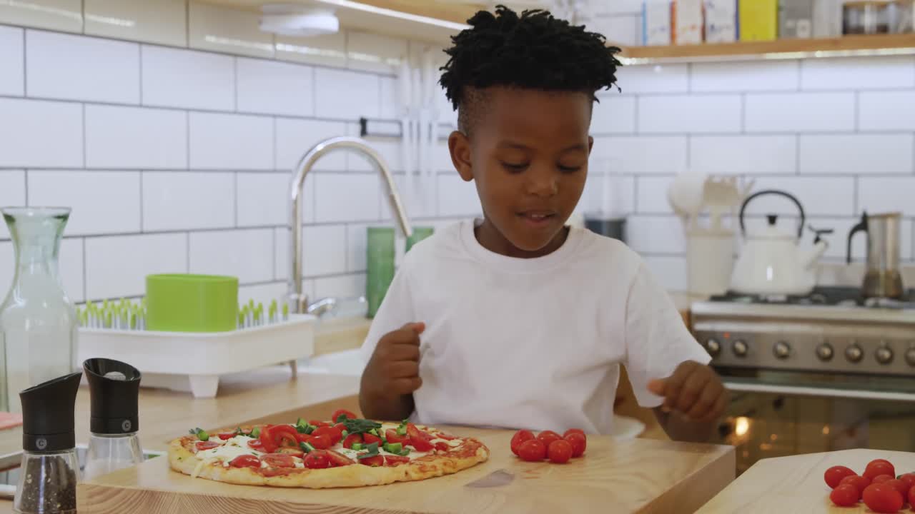 Father and son cooking together