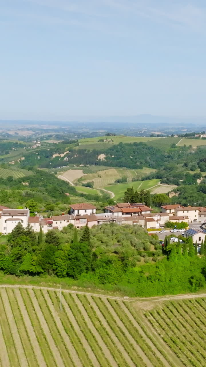 Vertical aerial of idyllic Tuscan homes in the Marcialla town, summer in Italy