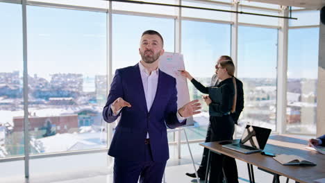 entrepreneur talking on business in office. business people working in the modern agency with large windows with city background.