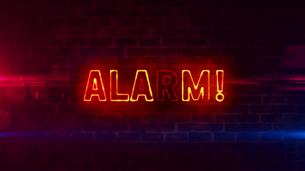 Alarm cyber security neon on brick wall