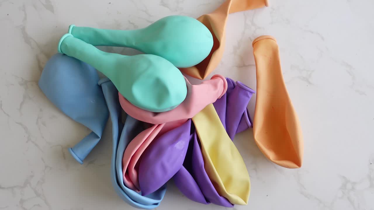 Pile of Deflated Colorful Balloons
