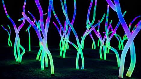 glowing neon forest installation