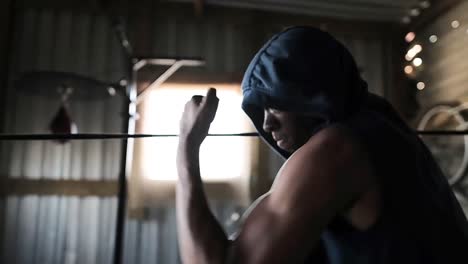 boxer practicing shadow boxing in the gym