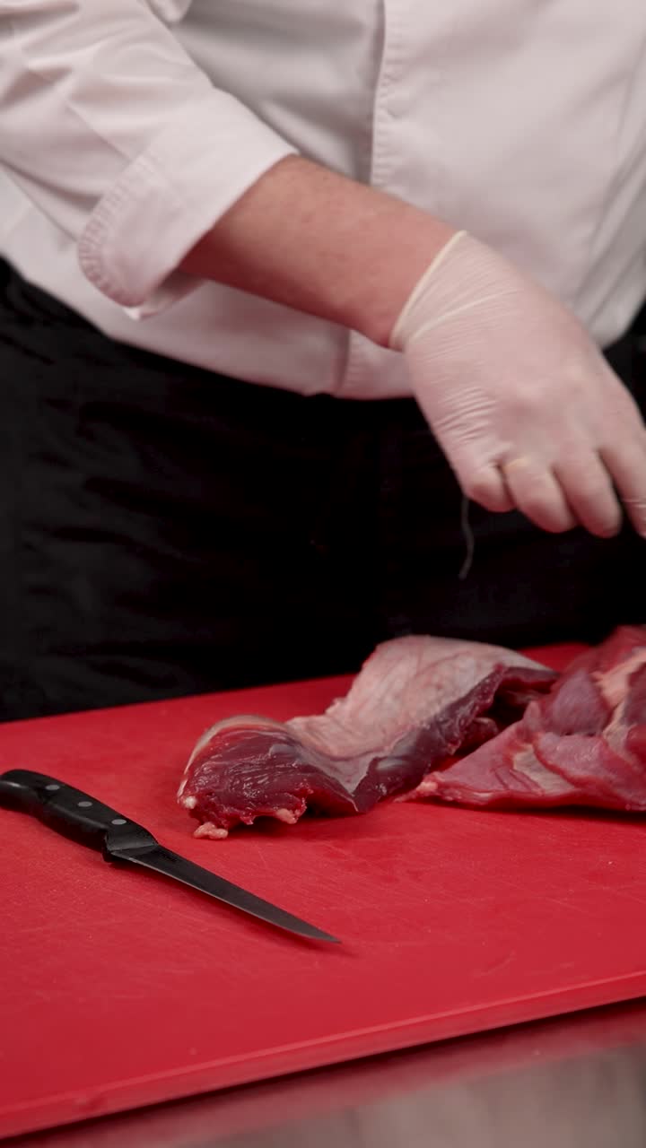 Chef Preparing Raw Beef