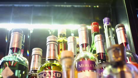 bottles of liquor on a bar display