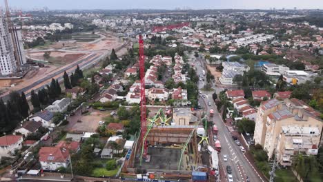 Panoramic-aerial-view-of-skyscrapers-in-construction-with-city-view,-Tel-Aviv,-Isreal