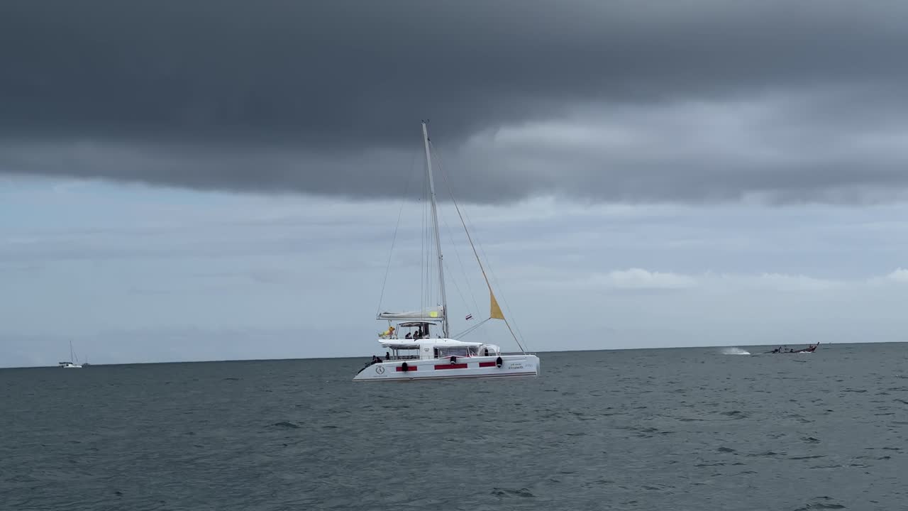 sailing boat in the sea, bad weather.