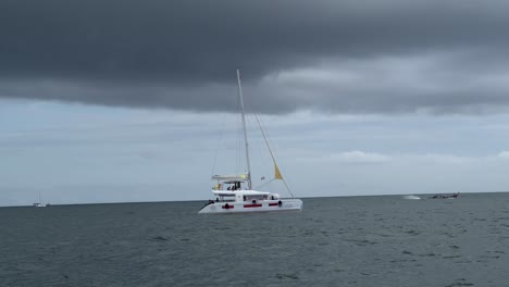 sailing boat in the sea, bad weather.