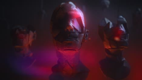 three crushed android heads on spikes in hell