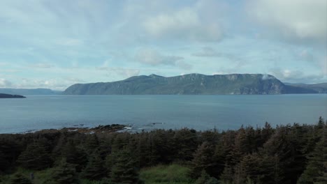 gros morne national park, newfoundland - push in drone clip with the mountain and ocean in the foreground