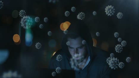 animation of macro coronavirus covid-19 cells over a hacker hooded man