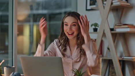 Happy professional react email notification in office. Closeup smiling manager
