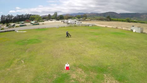 Aerial-view-above-a-K9-dog-in-training-attacking-trainer-2