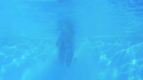 Low-angle-view-of-fit-swimmer-in-pool