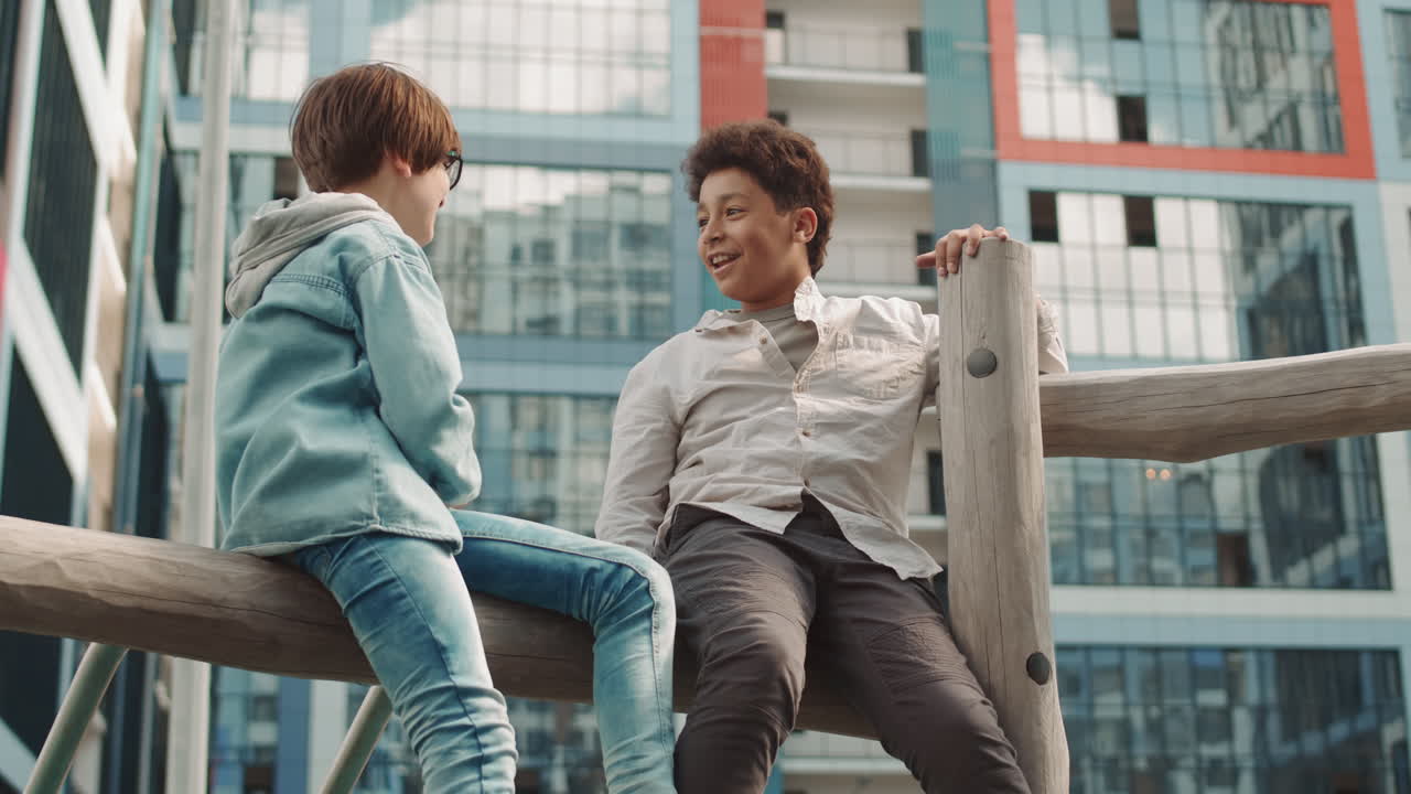 Schoolboys Chatting at Playground
