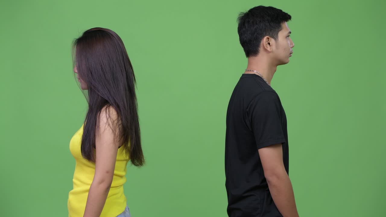 Young Asian couple looking frustrated together