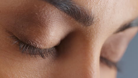 close up beautiful eyes opening macro beauty optometry concept