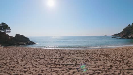 Scene-revealing-a-beautiful-hidden-empty-sandy-beach