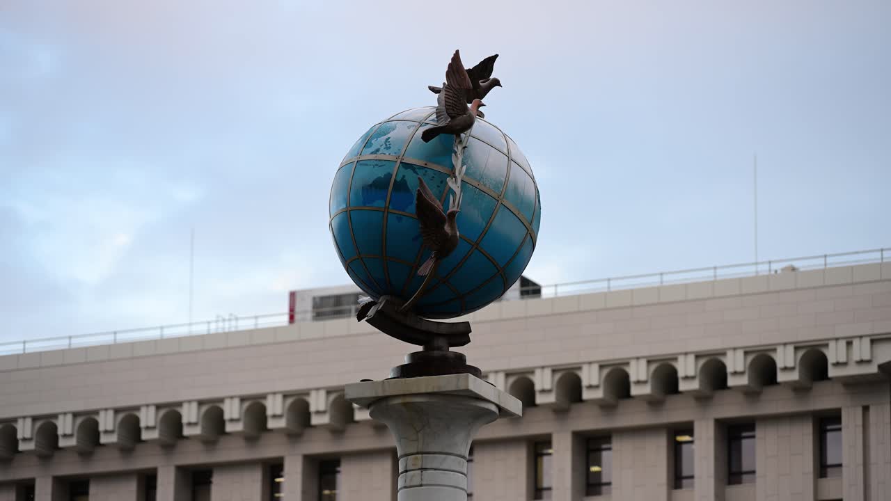 View of the Globus (Globe) statue in Independence Square, Kyiv, Ukraine.