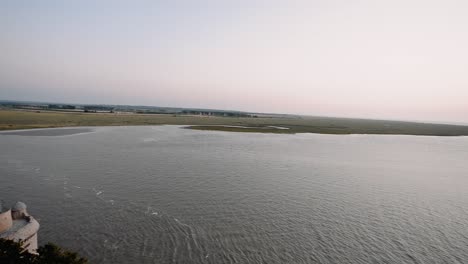 mont saint michel tide aerial view at sunset