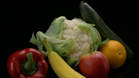 an arrangement of fruits and vegatables slide into frame