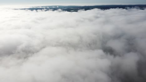 mist fog clouds from above aerial view over