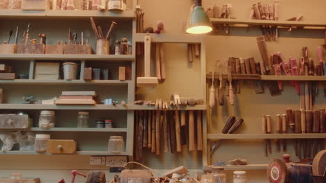 hand tools and workbench in carpentry workshop