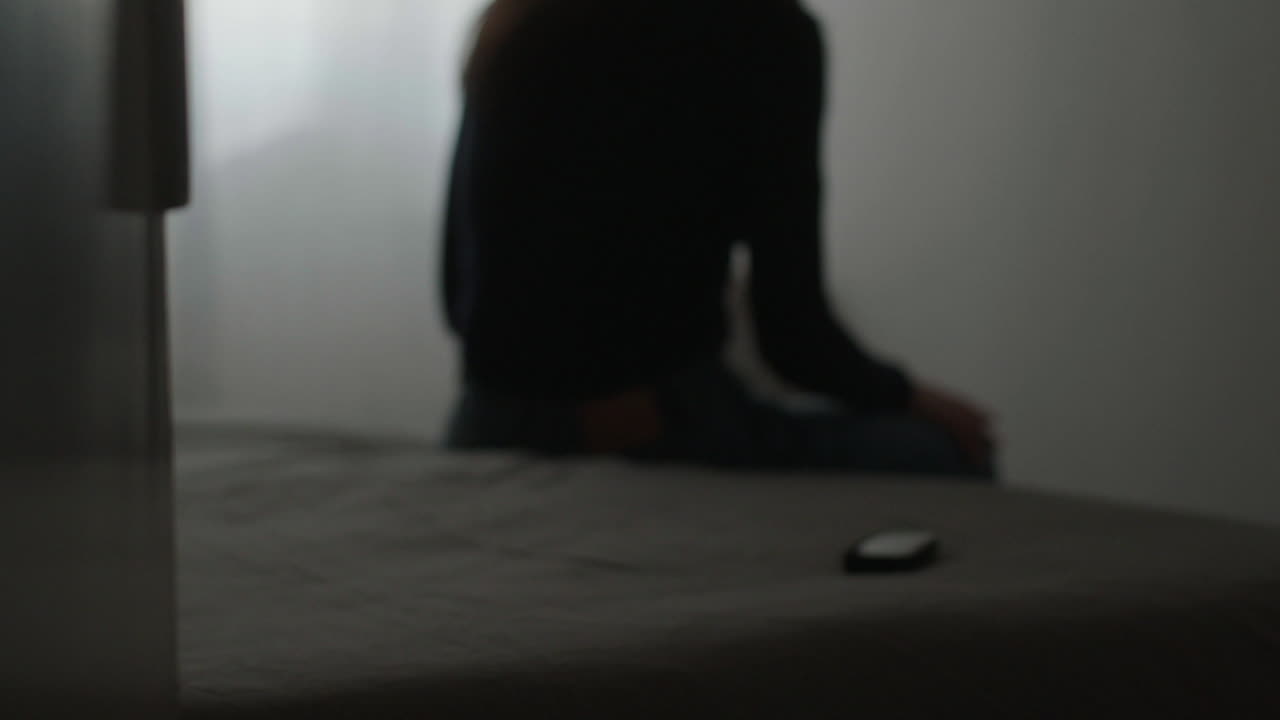 Woman Sitting on Bed, Night