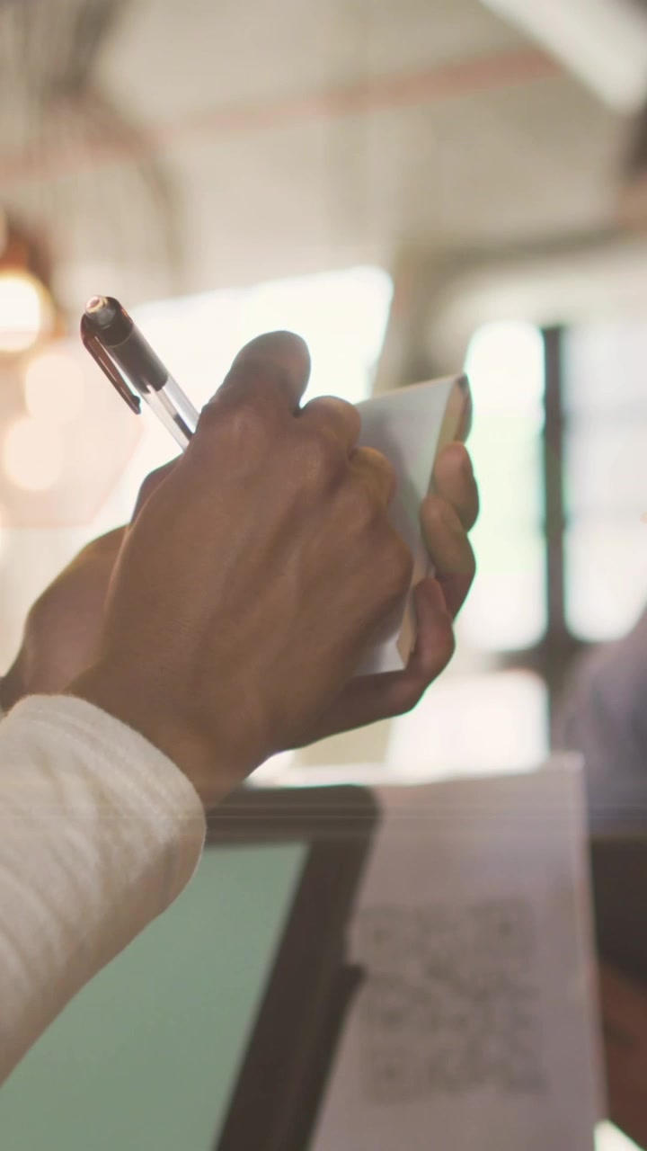 Animation of light spots over man ordering at cafe