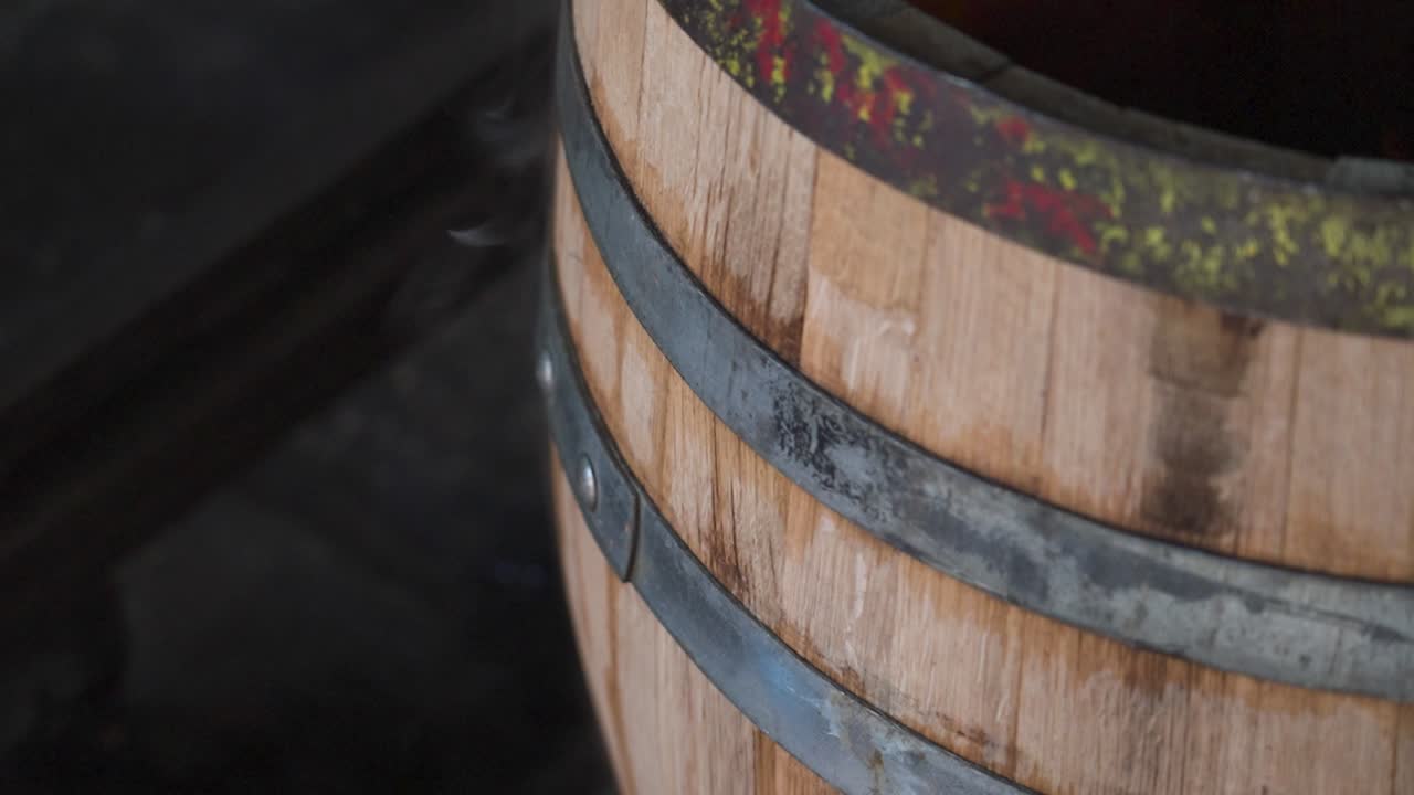 steam rising from a wooden barrel during the charring process 3