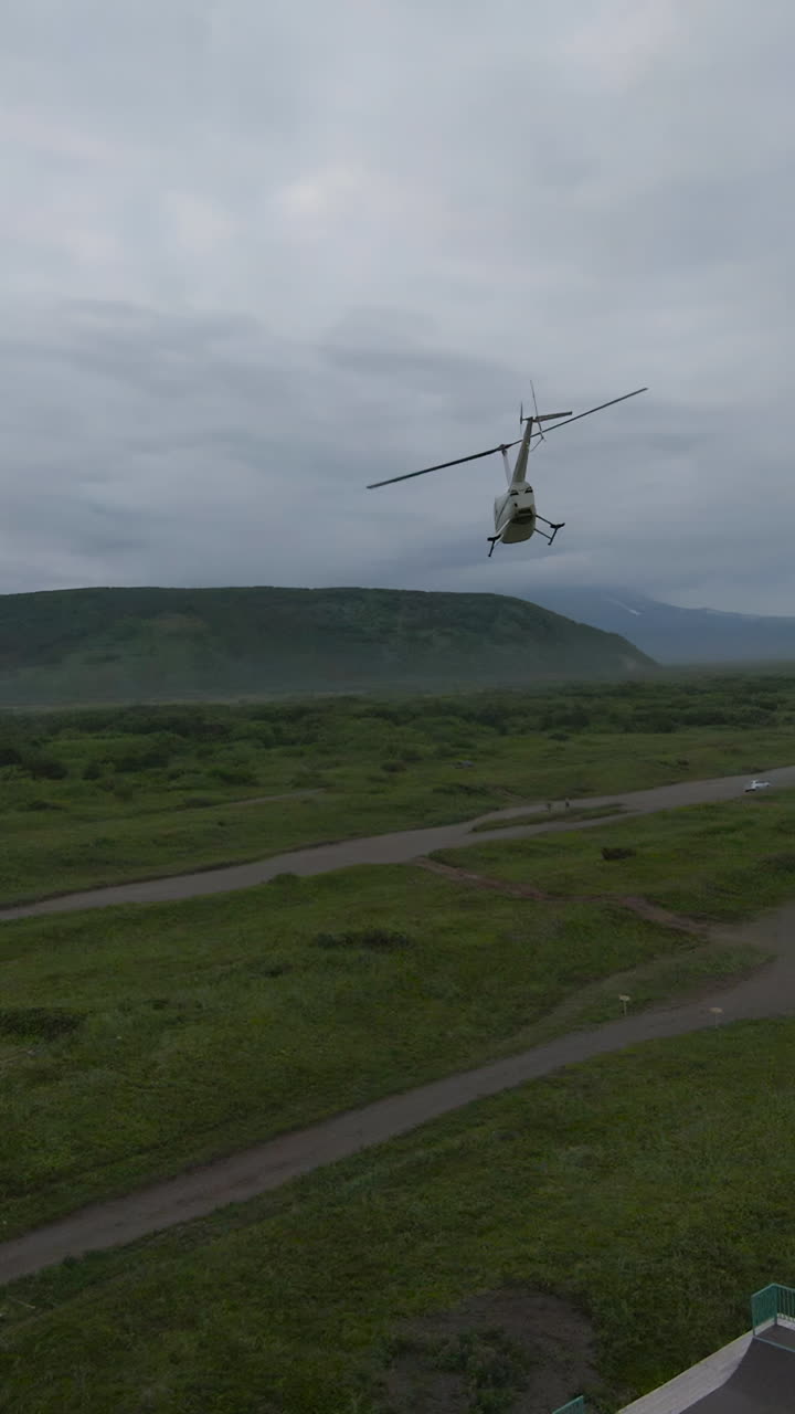 Helicopter Over Remote Alaskan Landscape