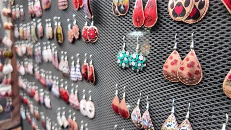 handmade copper earrings on display