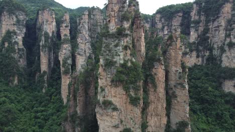 4k aerial reverse shot of hallelujah avatar mountain in wulingyuan scenic forest hunan province, china