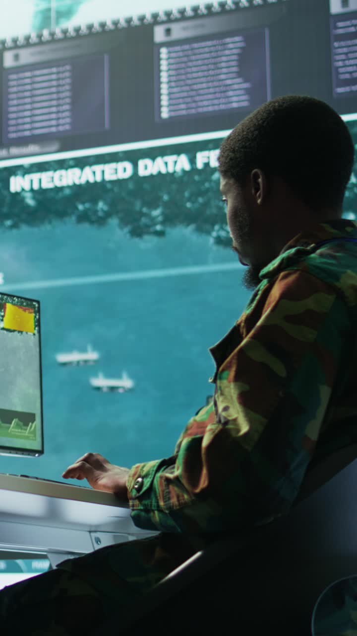 Vertical Video Military personnel in a control center working on data processing