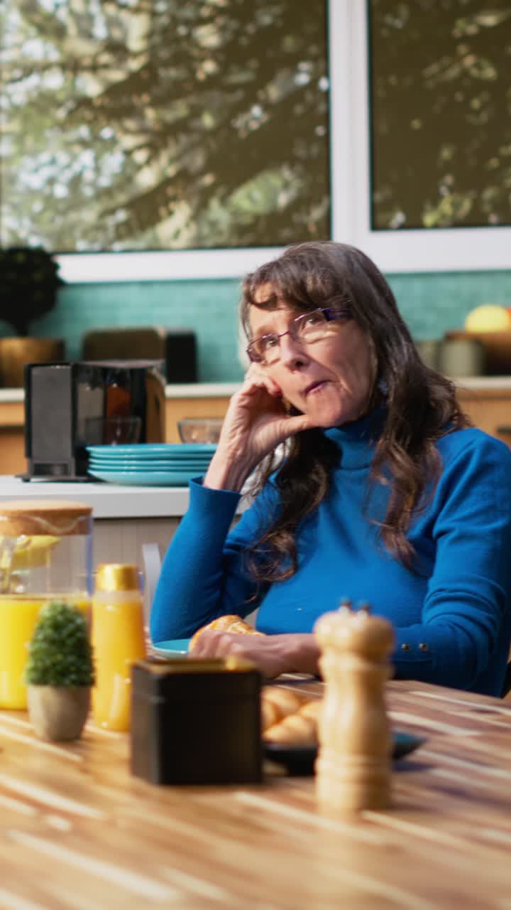 Vertical Video Mature wife appears overwhelmed and uninterested with silent irritation