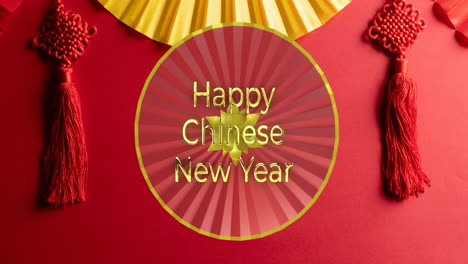 Animation-of-happy-chinese-new-year-text-over-chinese-pattern-on-red-background