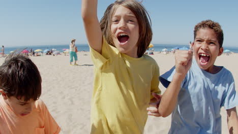 Close-up-shot-of-young-sportsmen-yelling-and-rejoicing-at-camera