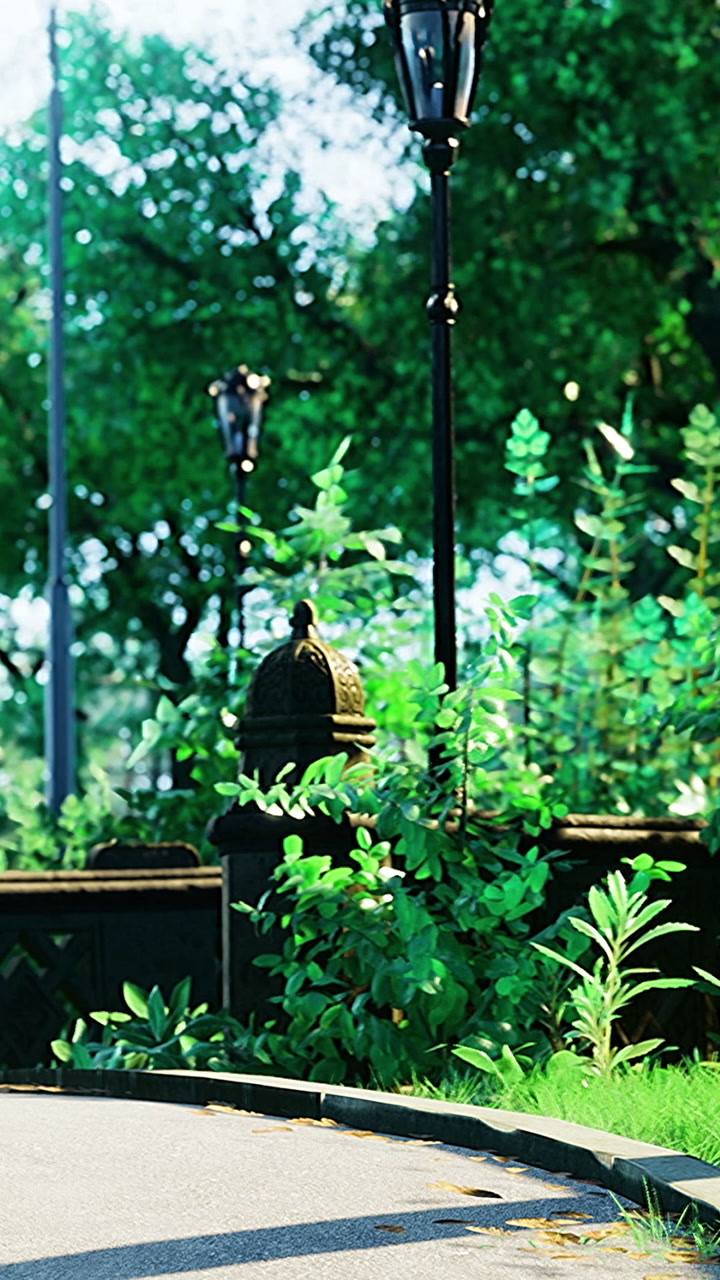 Walking path in a park with green plants and street lamps during daytime