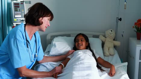 female doctor interacting with patient