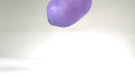 big purple water balloon falling