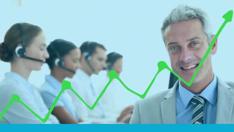 Animation-of-graph-over-diverse-business-people-using-phone-headset-in-office