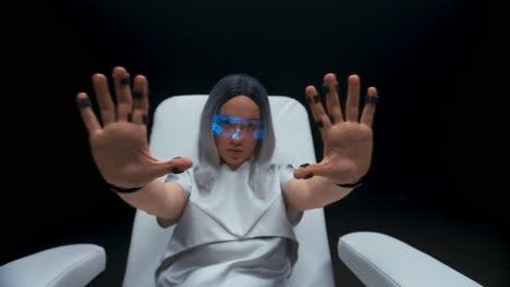 haptic sensors hands woman sitting armchair. teenager using augmented reality