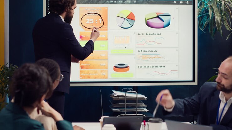 Project manager does a market research presentation for his team