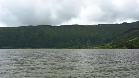 Volcanic-hills-at-the-shore-of-the-Blue-lake-in-San-Miguel-Island,-Azores,-Portugal