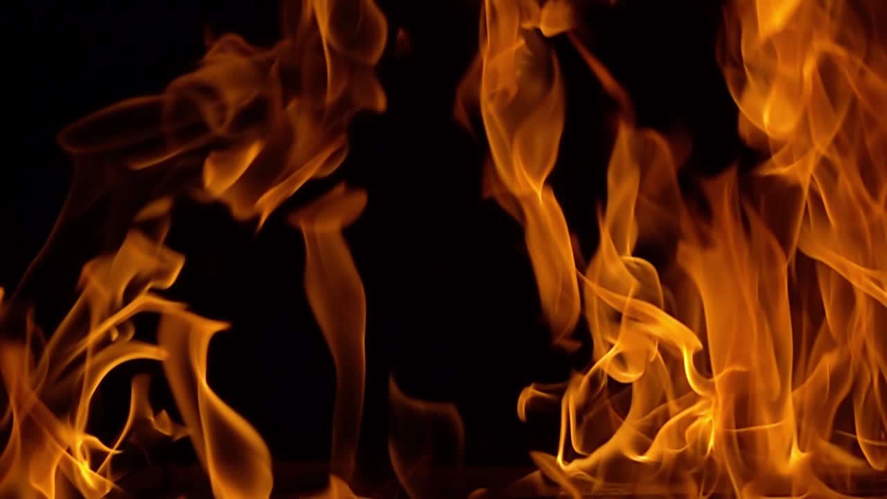 Flames of fire on black background in slow motion
