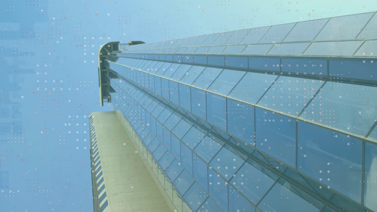 Skyscraper with glass facade reflecting sky, overlaid with digital data animation