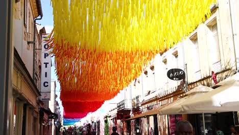 vibrant overhead decorations in a bustling street