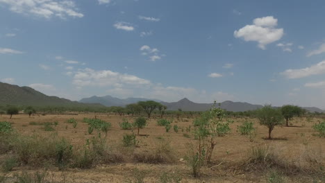 driving wide shot through the african countryside desert-01