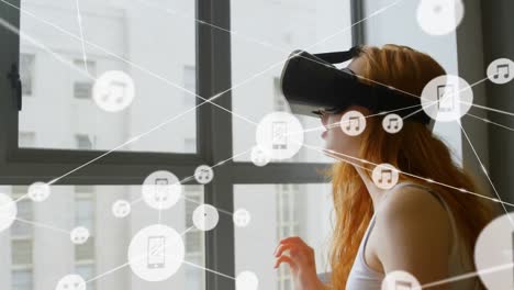 Animation-of-network-of-connections-with-icons-over-woman-wearing-vr-headset