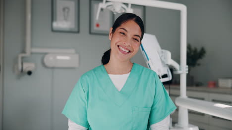 smiling dentist in her office